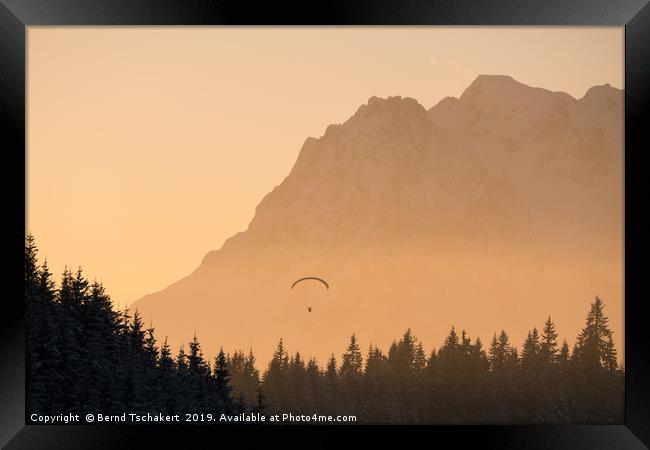 Paraglider in front of mountain, Salzburg, Austria Framed Print by Bernd Tschakert