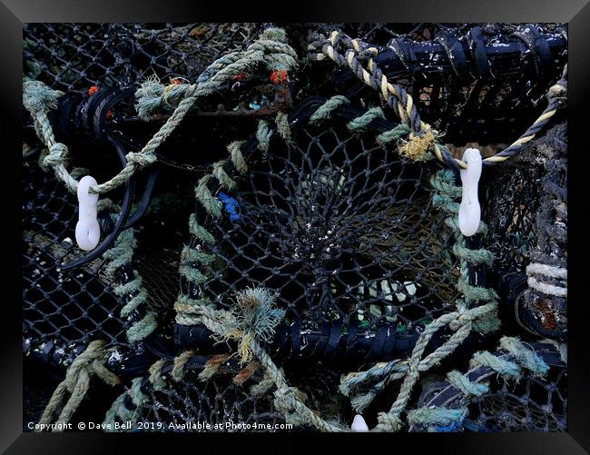 Crab Pots Framed Print by Dave Bell