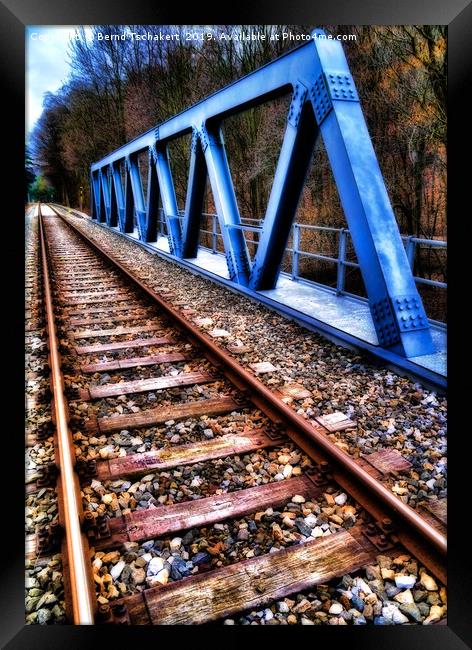 Train track on a small bridge, Austria Framed Print by Bernd Tschakert