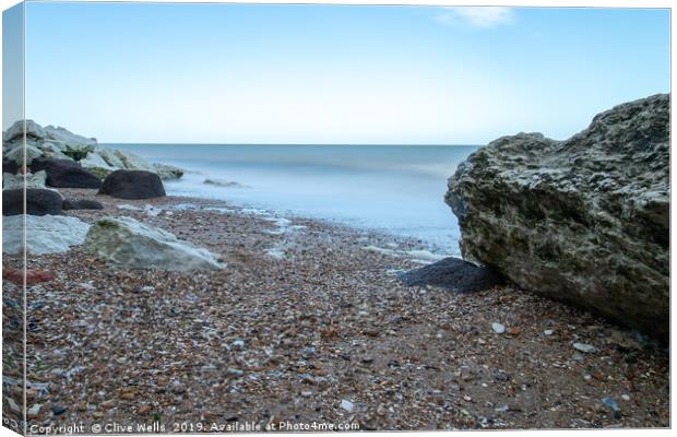 Long Exsposure of sea and rocks at Hunstanton, Nor Canvas Print by Clive Wells