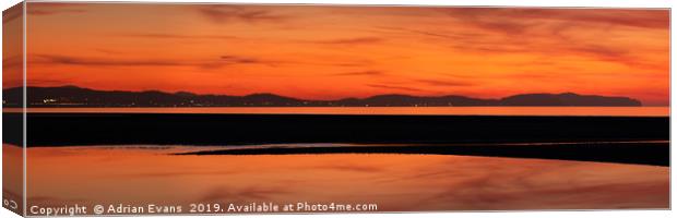 Seascape Sunset Panorama Canvas Print by Adrian Evans