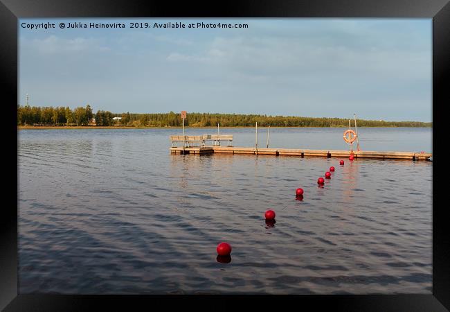 Pier And Buoys On The Lake Framed Print by Jukka Heinovirta