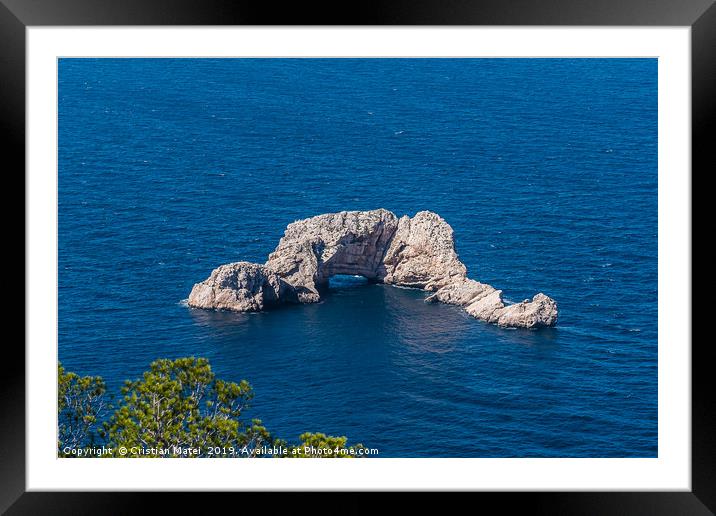 Sa Foradada rock on the blue water of Ibiza Island Framed Mounted Print by Cristian Matei