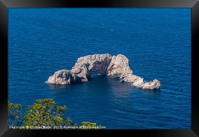 Sa Foradada rock on the blue water of Ibiza Island Framed Print by Cristian Matei