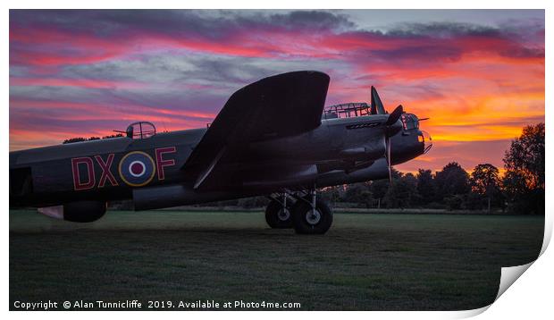 Lancaster bomber Just Jane with a sunset Print by Alan Tunnicliffe