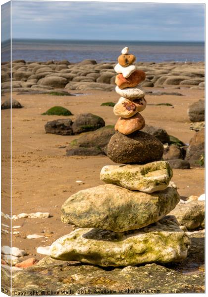 Stones at Old Hunstanton beach in Norfolk Canvas Print by Clive Wells