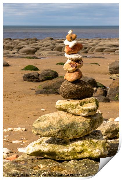 Stones at Old Hunstanton beach in Norfolk Print by Clive Wells