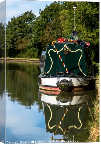 Moored boat on the Grand Union Canal at Blisworth Canvas Print by Clive Wells