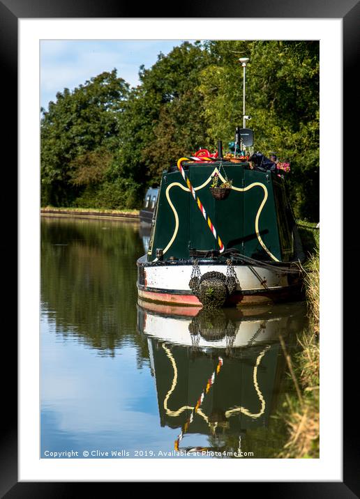 Moored boat on the Grand Union Canal at Blisworth Framed Mounted Print by Clive Wells