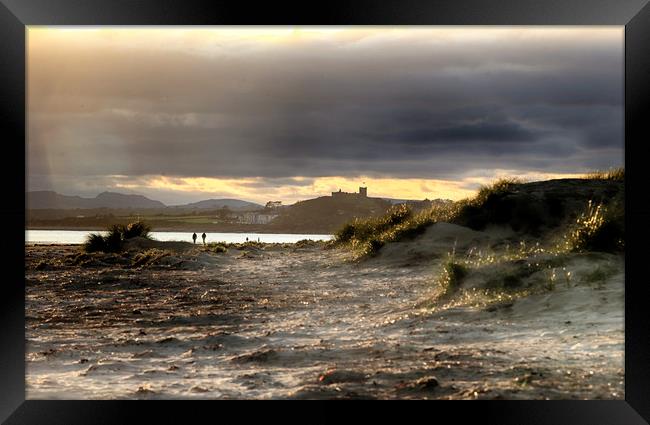Sunset over Black Rock Sands Framed Print by Ceri Jones