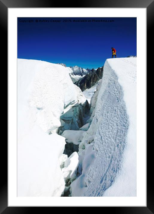 Crevasse climber. Framed Mounted Print by Ashley Cooper
