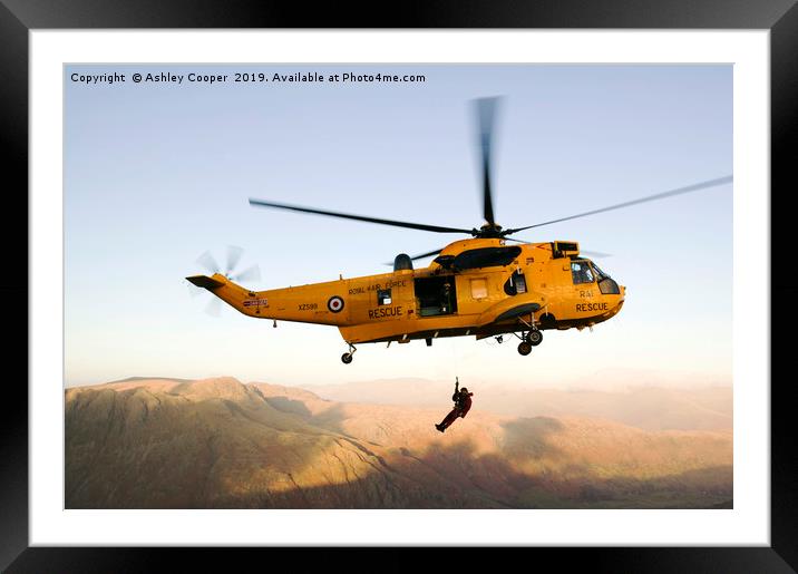 Sea King rescue. Framed Mounted Print by Ashley Cooper