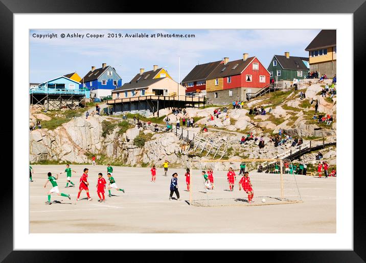 Greenland football. Framed Mounted Print by Ashley Cooper