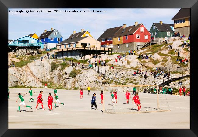 Greenland football. Framed Print by Ashley Cooper
