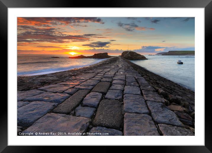 Setting sun at Bude Breakwater Framed Mounted Print by Andrew Ray