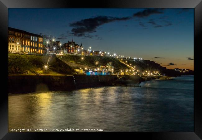 Cromer at night taken from the pier in Norfolk Framed Print by Clive Wells