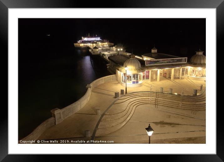 Cromer Pier at night, Norfolk Framed Mounted Print by Clive Wells