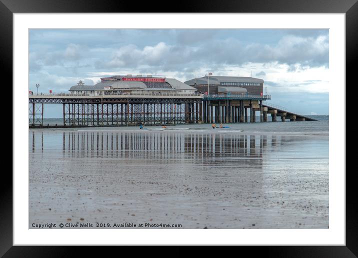 Reflections of Cromer Pier in Norfolk Framed Mounted Print by Clive Wells