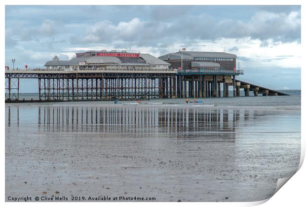 Reflections of Cromer Pier in Norfolk Print by Clive Wells