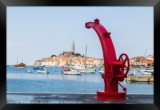 Boat crane in Rovinj Framed Print by Jason Wells