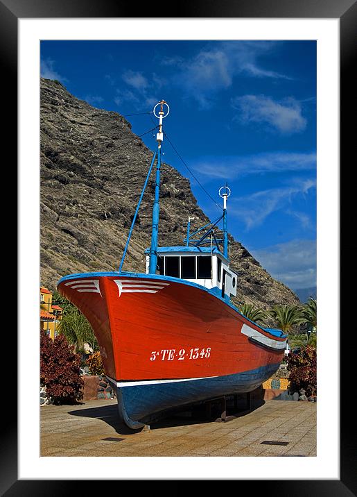 Red Boat Framed Mounted Print by Geoff Storey