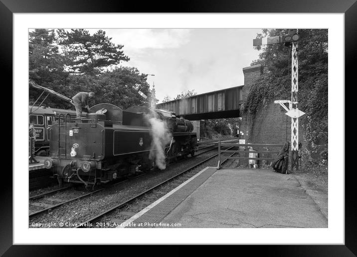 Steam train seen at Sheringham Station Framed Mounted Print by Clive Wells