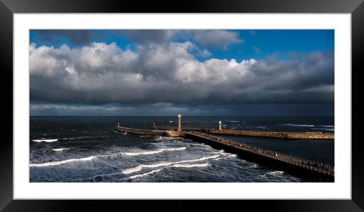 Stormy Skies over Whitby Pier Framed Mounted Print by Dan Ward