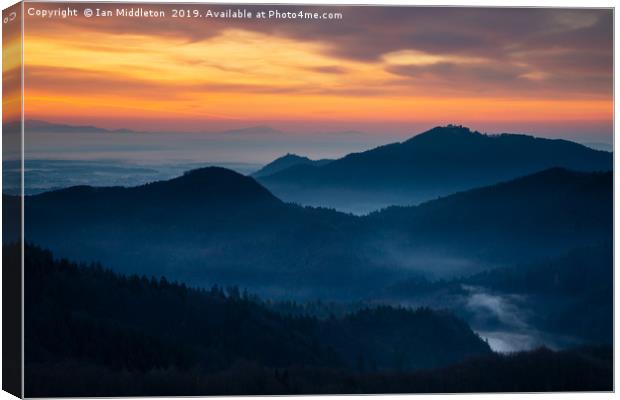 Sunrise view across to Sv Jost from the Jamnik Hil Canvas Print by Ian Middleton