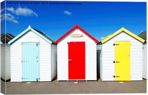 seaside beach huts Canvas Print by Kevin Britland