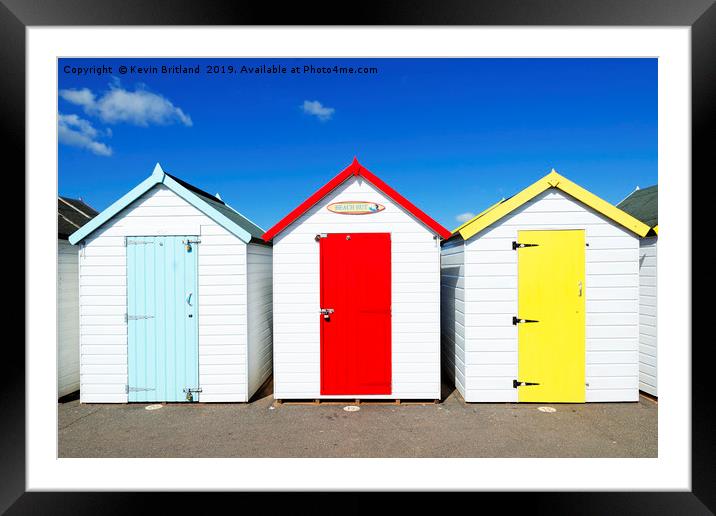 seaside beach huts Framed Mounted Print by Kevin Britland