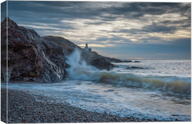 Mumbles lighthouse with wave. Canvas Print by Bryn Morgan