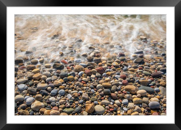 Pebbles at Bracelet bay. Framed Mounted Print by Bryn Morgan