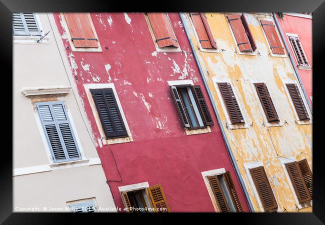 Pastel-coloured houses in Rovinj. Framed Print by Jason Wells