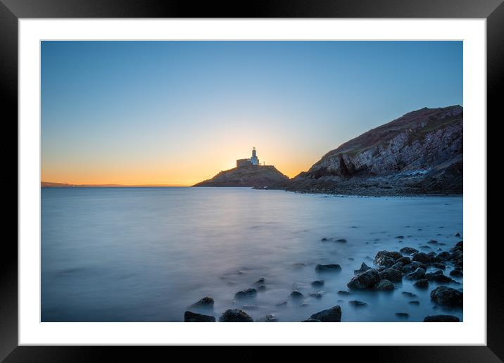 Mumbles lighthouse at sunrise. Framed Mounted Print by Bryn Morgan