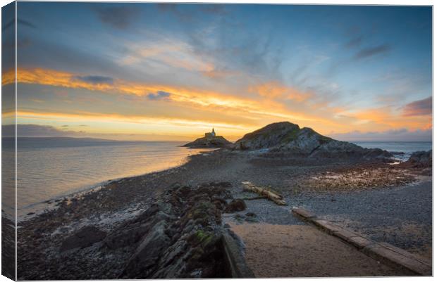 Daybreak at Mumbles lighthouse. Canvas Print by Bryn Morgan