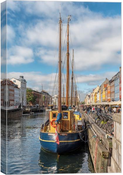 Copenhagen Nyhavn District Fishing Boat Canvas Print by Antony McAulay