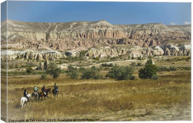 Riding Through Cappadocia Canvas Print by Ian Lewis