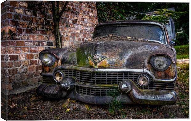 Old Caddy by Brick Wall Canvas Print by Darryl Brooks