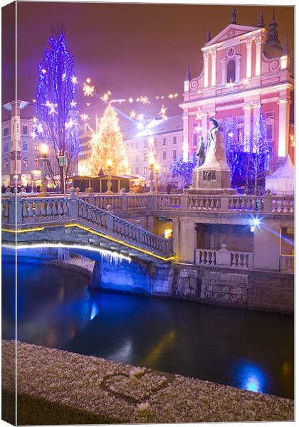 Christmas lights in Preseren Square in Ljubljana Canvas Print by Ian Middleton