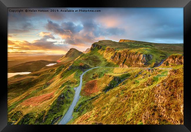 Dramatic sunrise sky over the Quiraing  Framed Print by Helen Hotson