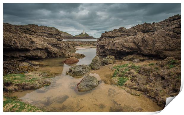 Mumbles lighthouse viewed from a rock pool. Print by Bryn Morgan