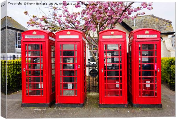 red telephone boxes  Canvas Print by Kevin Britland