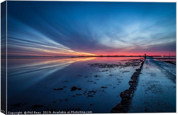 Sunrise at Holy Island causeway Canvas Print by Phil Reay