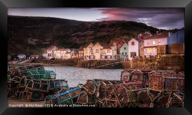 Staithes harbour at sunrise Framed Print by Phil Reay