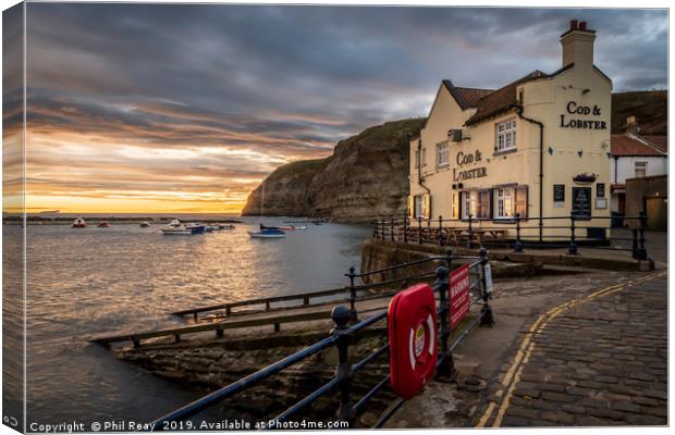 Staithes harbour at sunrise Canvas Print by Phil Reay