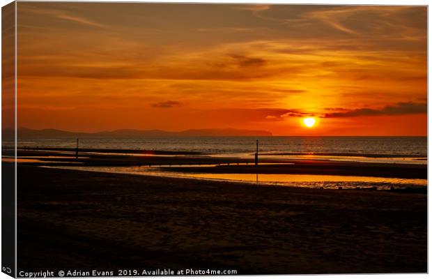 Sunset Wales Canvas Print by Adrian Evans
