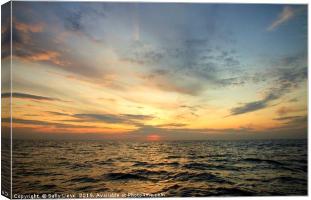 Sunset sea Norfolk coast Canvas Print by Sally Lloyd