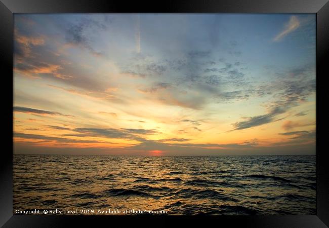 Sunset sea Norfolk coast Framed Print by Sally Lloyd
