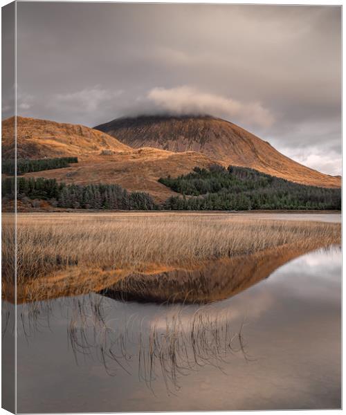 Beinn na Caillich Reflections Canvas Print by Paul Andrews