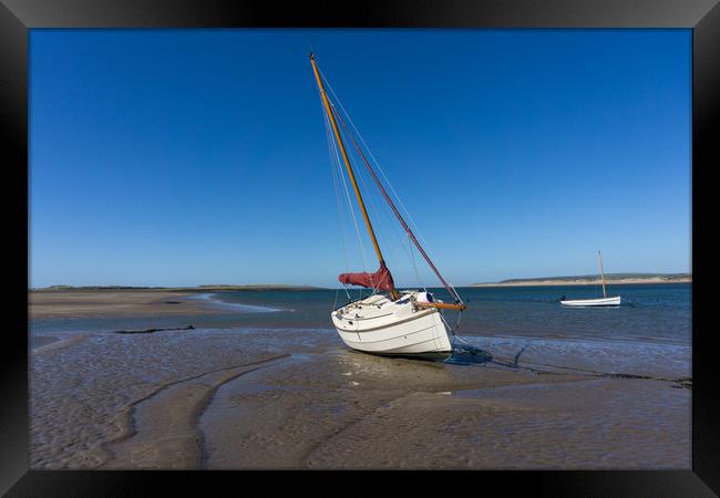 Yacht moored on Grey sands beach at Appledore Framed Print by Tony Twyman